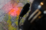 Red LED Light from the Flitelite classic lip light on Navigation Chart